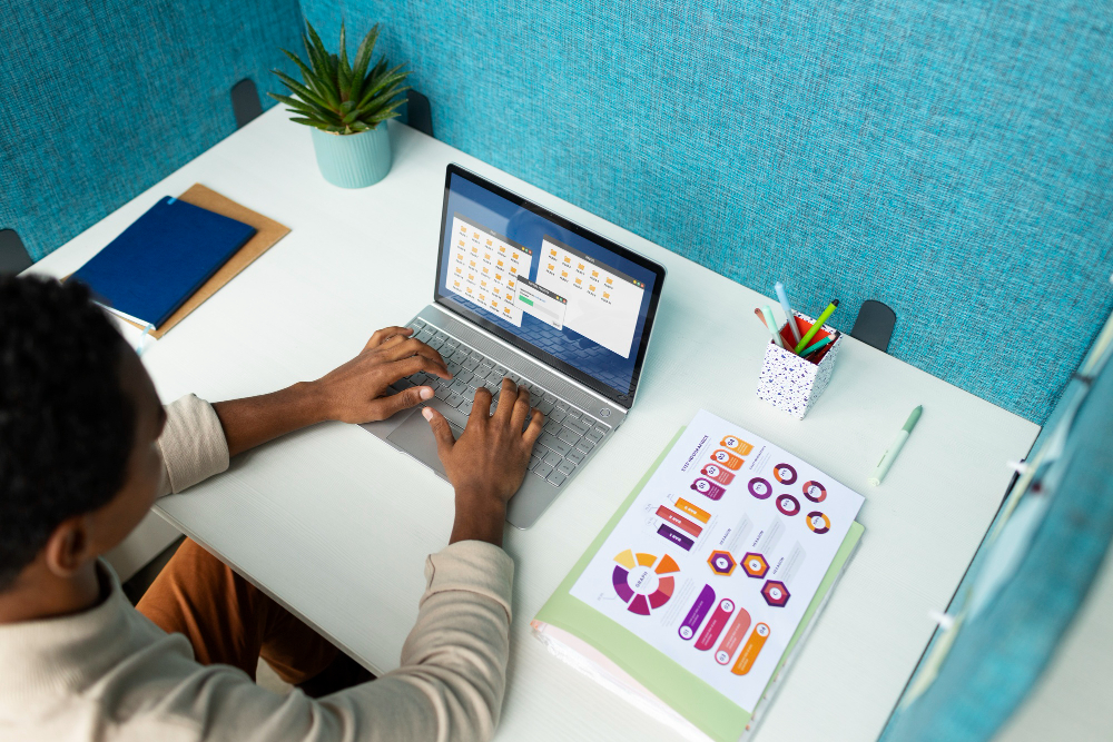 high-angle-woman-working-laptop